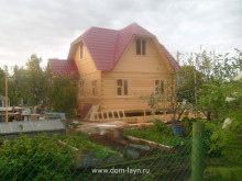 Дом из бруса с черепичной кровлей
